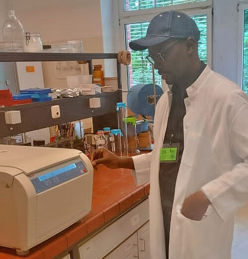Dr. Mazi Sanda prepares samples for analysis